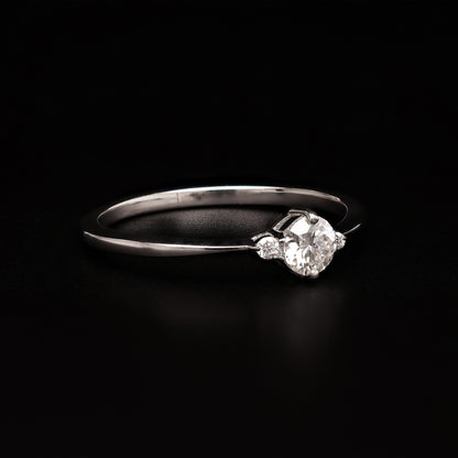 Round Trio Gleam – Minimalist Three-Stone Ring