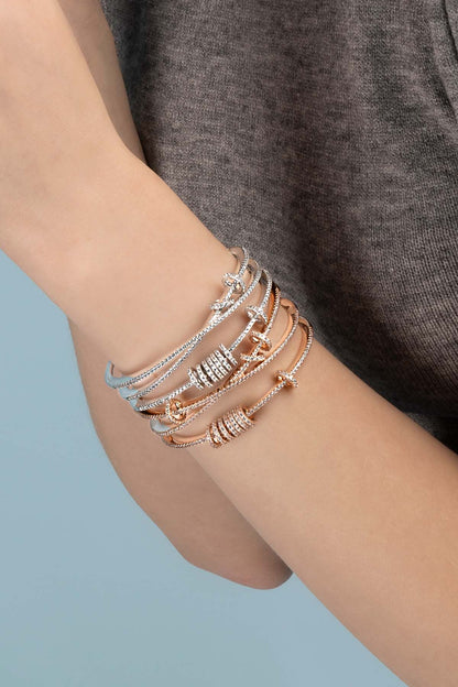 Triple cuff with sliding rings